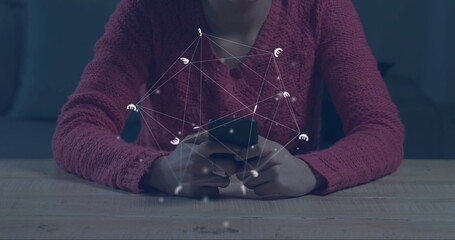 Poster - Image of globe with connections over caucasian woman using smartphone