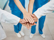 © peopleimages.com - Doctors, support and hand stack in collaboration for team building, medical goal and mission for surgery. Healthcare staff, above and huddle for solidarity, community and partnership in hospital