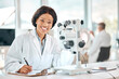 © peopleimages.com - Black woman, microscope and portrait in laboratory for research, analysis and medical work. Scientist, professional and notes or writing for innovation and documents in hospital for report or results