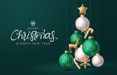 Merry christmas greeting vector design. Christmas hanging balls, glitter bauble, candy cane, snowflakes and gold star decoration elements in xmas tree shape for holiday season green background. Vector