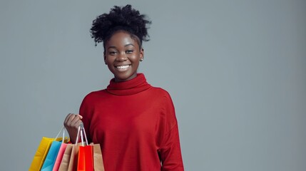 Poster - An African female customer holding her shopping bags with a confident stance, beaming with satisfaction against a gray backdrop. 