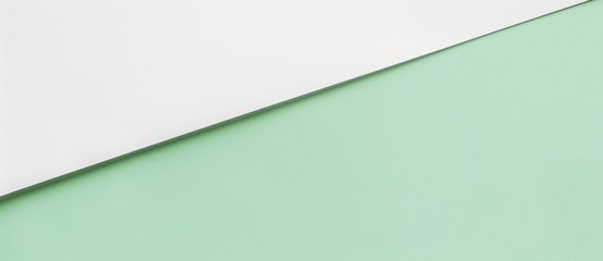 Poster - Minimalist image featuring a white sheet of paper partially covering a green background, creating an abstract composition with a diagonal line