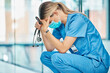 © Oostendorp/peopleimages.com - Stress, tired nurse and woman in hospital with depression, burnout or anxiety for mistake. Sad, surgery fail and medical worker with grief, fatigue or headache in healthcare clinic with stethoscope