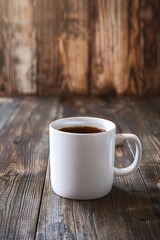 Poster - A cup of coffee placed on a wooden table
