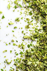 Poster - A natural scene with a pile of fresh green leaves on a white surface