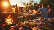 © Bundi - A close up shot of barbecued meat on a table in a garden in the background with a blur effect. Beach party, summer, food, happiness, sunshine, backyard, neighbors, family gathering, neighbors.