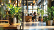 © Pixel Chaser  - Bright and modern office space with plants and people working in the background, highlighting productivity and a welcoming environment