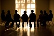 © Dina - silhouettes of people at group therapy session, support of community through conversations and being together at reunions and sessions