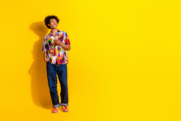 Canvas Print - Full body portrait of nice young man hold phone look empty space wear shirt isolated on vivid yellow color background