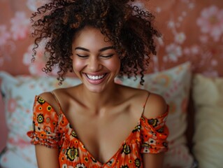 Expressive image of a woman with curly hair smiling