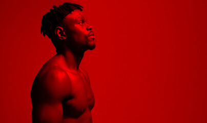 Poster - Fitness, thinking and man in red lighting for relax, wellness and memory for exercise. Athlete, confidence and inspiration or idea for workout, training and health or self care by studio background