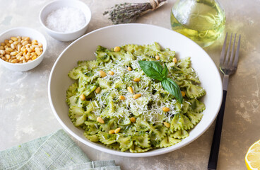 Farfalle pasta with pesto sauce. Healthy eating. Vegetarian food.