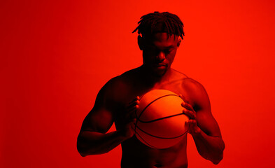 Poster - Basketball, fitness and performance with man in red background filter lighting for challenge, game or training. Competition, exercise and sports with serious African person in studio for recreation