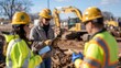 © Level UP - Diverse Construction Team in Yellow Safety Gear Discussing Plans on Tablets at Busy Worksite Under Blue Skies