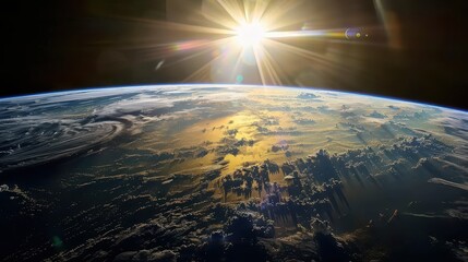 Wall Mural - A beautiful image of the sun rising over the earth. The sky is filled with clouds and the sun is shining brightly