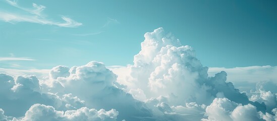 Wall Mural - Soft-focused white clouds against a blue sky background with room for a copy space image.