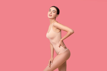 Sticker - Beautiful woman with perfect skin on pink background. Body care