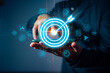 © teerawat - Businessman with target arrow virtual digital technology icon, business investment objectives and goals Marketing strategies and goals for success.