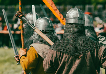 Canvas Print - Knights in armor with weapons at war