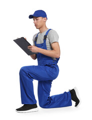 Canvas Print - Auto mechanic working with clipboard on white background