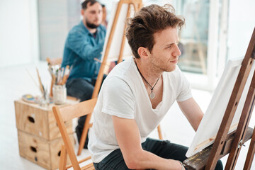 Aufkleber - Student, man and painting in art class with canvas for university project, inspiration or education. Workshop. talent and male artist person with easel for relax, watercolor or creativity in studio