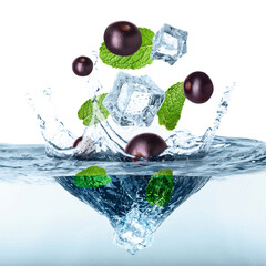 Wall Mural - Acai berries, mint leaves and ice cubes falling into water on white background