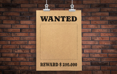 Sticker - Poster Wanted hanging on brick wall. Space for design