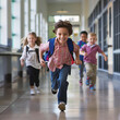 © ZAID KHALID - Happy children running in school hallway