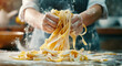 © Poj - Freshly made pasta being tossed in flour by a chef. Generative AI.