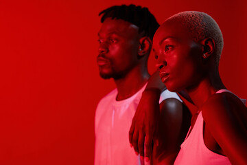 Poster - Woman, man and thinking with red lighting for fitness, together and pride for teamwork. People, personal trainer and memory for workout, exercise and health or wellness by studio background or mockup