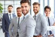 © Konstiantyn Zapylaie - A group of professionals in suits stand together, looking confident and ready to tackle any challenge