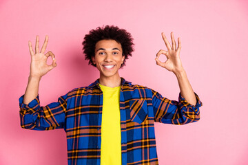 Sticker - Photo of cheerful glad nice man wear plaid trendy okey sign isolated on pink color background