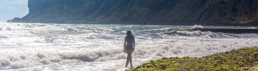 Wall Mural - Girl by the sea