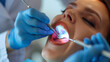 © Stock Source - Dentist performing a deep dental cleaning for oral health maintenance
