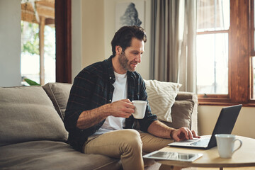 Poster - Remote work, laptop and man on sofa with drink, blog and company review at home. Male person, small business and technology in living room for contact, ecommerce and interior design on internet