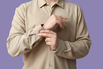 Poster - Young man in stylish beige collar shirt on lilac background, closeup