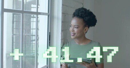 Sticker - Image of financial data processing over african american businesswoman in office