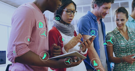 Poster - Image of ecology icons over diverse colleagues using tablet in office