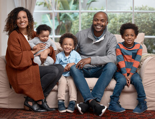 Poster - Smile, black family and portrait on sofa for love, trust and support in living room. Parents, children and relax at home for hug, relationship development and security on couch with happiness or care