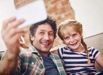 Poster - Happy father, daughter and hug with selfie for picture, photography or memory together at home. Dad, child or little girl with smile for bonding, holiday or weekend moment on lounge couch at house