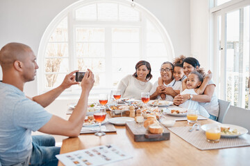 Sticker - Home, man and family with photography for dinner with smile for thanksgiving, gathering and reunion. People, generations and happy with food in table for memories, fun and social media with bonding