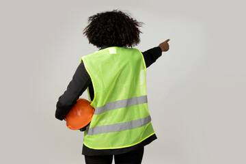 Wall Mural - PNG,A young girl in the form of a construction worker with a hard hat, isolated on white background