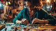 © Lakkhana - A woman creating handmade jewelry, carefully assembling beads and charms at a crafting table