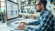 © Oulaphone - Architect man using computer for drawing bridge design at modern office.
