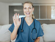 © Maass/peopleimages.com - Happy woman, portrait and doctor with wave on sofa for video call, greeting or telehealth at home. POV of young female person, nurse or medical employee with smile for online healthcare or advice