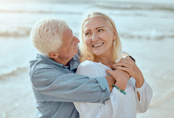 Canvas Print - Mature, couple and hug on beach with care on retirement vacation, romance and together with years of commitment. Man, woman and affection by ocean on summer holiday, love and bonding with embrace.