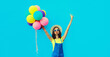 © rohappy - Summer, holiday, celebration, happy cheerful young woman with bright colorful balloons on blue