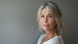 © Mechastock - Beauty portrait of a mature older woman / confident, pretty, close-up photo