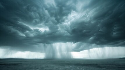 Poster - A dramatic and clear photo of a stormy sky with dark clouds and heavy rain pouring down over a landscape