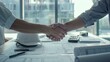 © MP Studio - The construction deal handshake